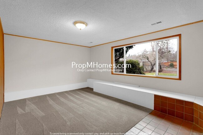 Building Photo - Updated Four Bedroom Home w/ Huge Yard!