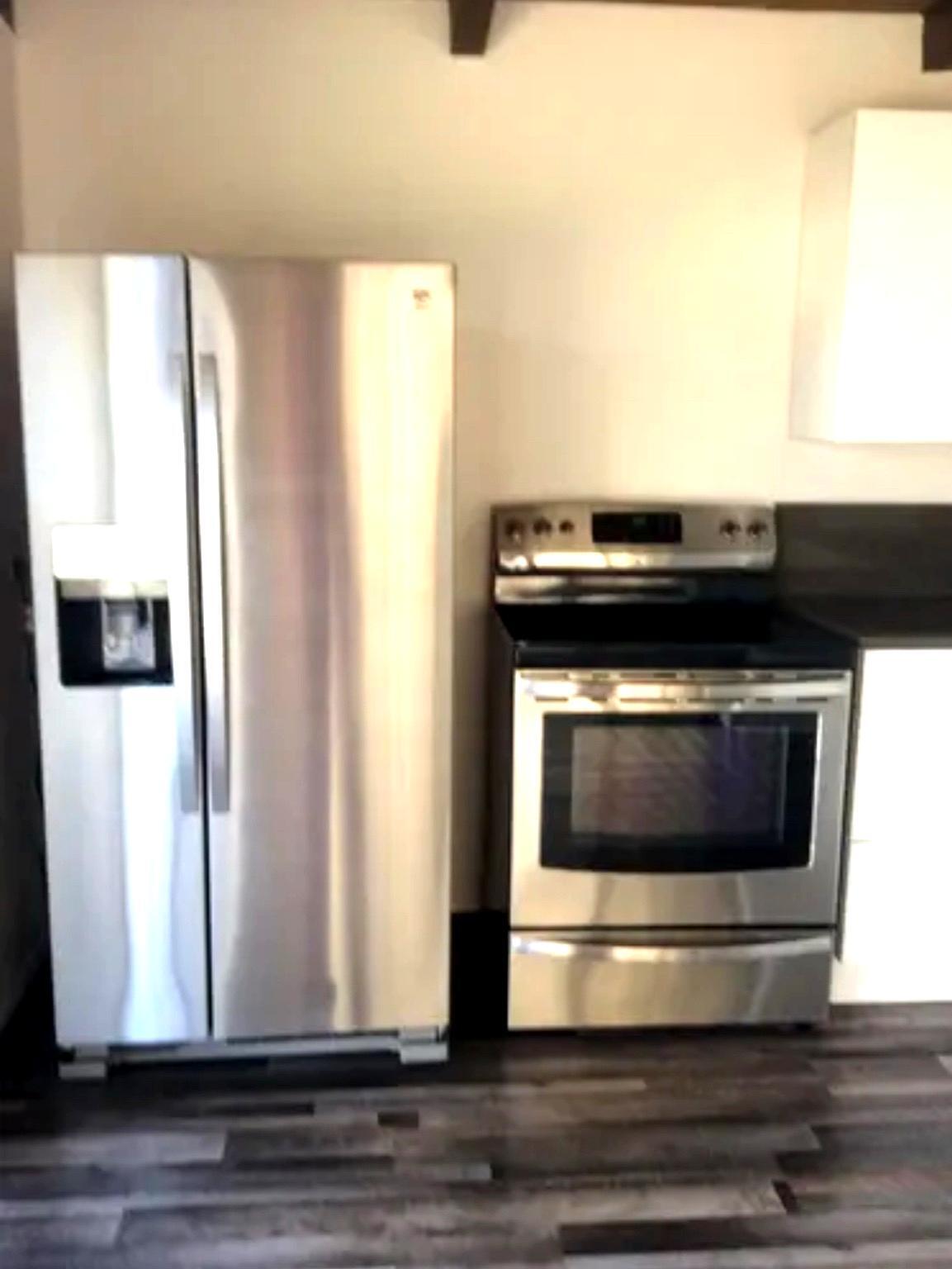 Refrigerator with Ice maker and Range - 506 122nd St S