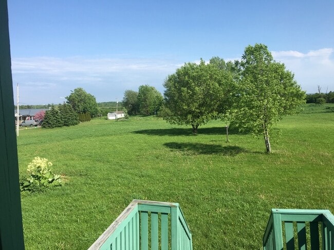 Building Photo - Beautiful secluded 4 bedroom 2.5 bath home with 2 stall detached garage and descent sized yard