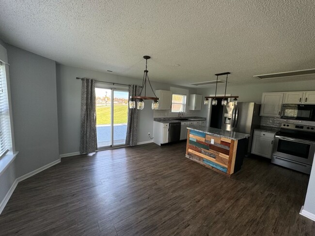 Building Photo - Move-In Ready Corner Lot Gem with Modern U...