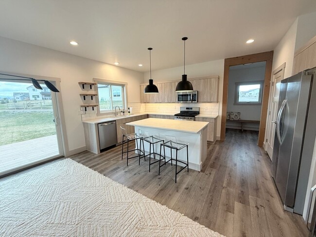 Building Photo - Stunning 4 Bed 3 Bath Single Family Home With Garage located Towards Canyon Ferry!