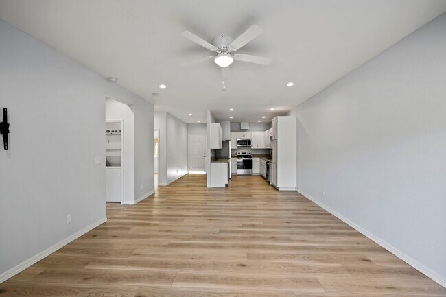 Living Space looking into kitchen - Cala Luxury Apartments