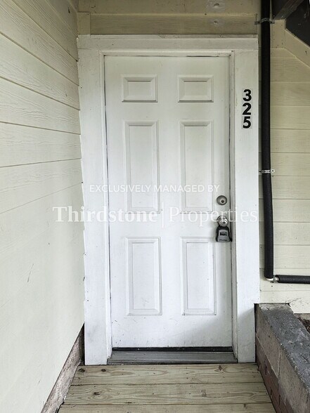 Building Photo - 325 7th St W