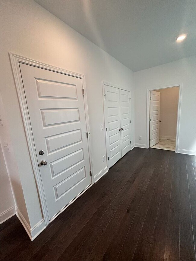 Building Photo - **BE THE LUCKY ONE TO LIVE IN THIS 2024-BUILT END-UNIT TOWNHOME IN A RESORT-STYLE COMMUNITY**