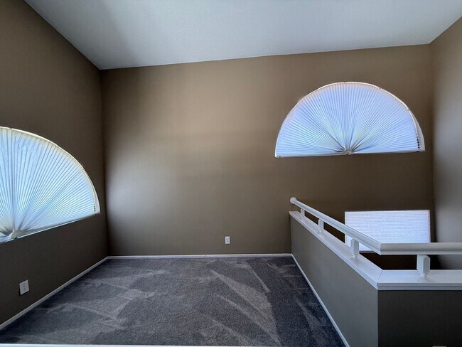 Building Photo - TWO BEDROOM TOWNHOME IN THE LAKES WITH GARAGE AND ATTACHED CARPORT