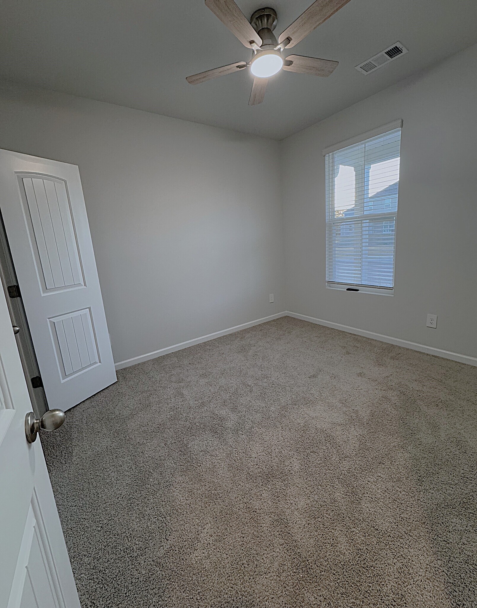 Downstairs, there is one additional swing bedroom/office space. - 403 Augustine Dr