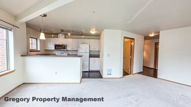 Building Photo - Sunny Capitol Hill 2 BR 1.5 BA Condo with Garage Parking Included & Skyline Views!