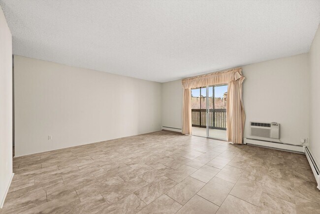 Building Photo - 7040 E Girard Ave