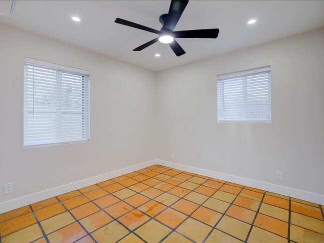 Building Photo - Cozy 2-Bedroom Home with Community Pool & Covered Parking