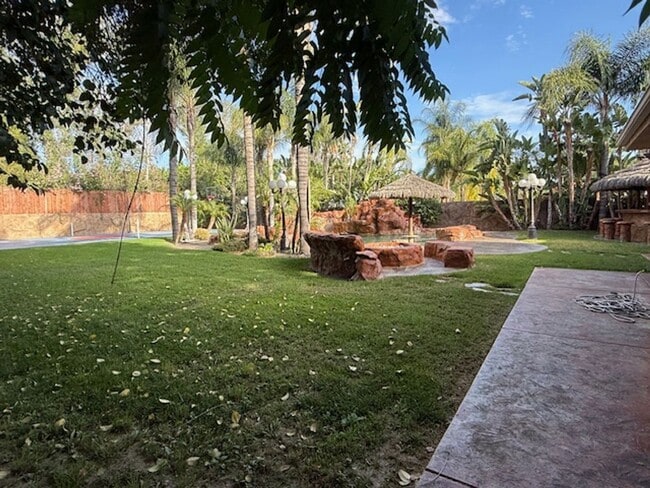 Building Photo - Gated estate with a backyard oasis