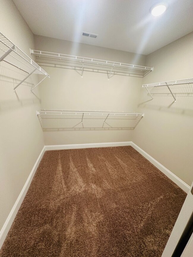 Building Photo - Beautiful Like-New 3 bed/2.5 bath w/ 2-car garage & fenced in backyard available June 24th!