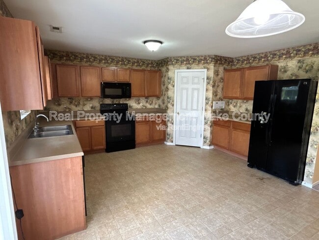 Building Photo - 5323 Seaspray Ln
