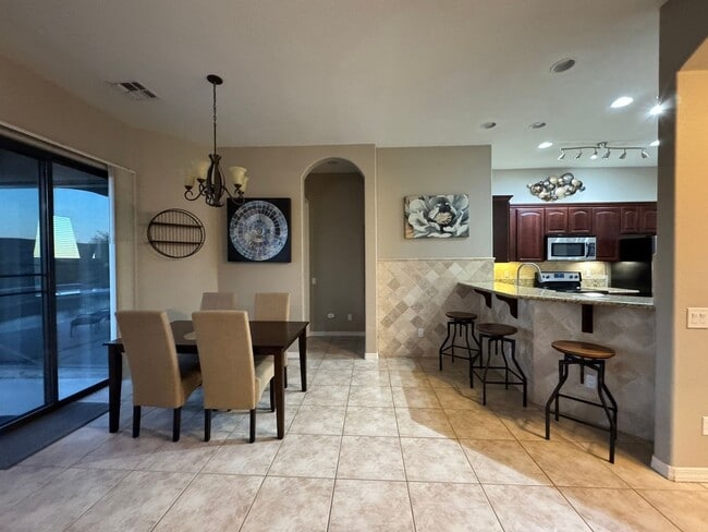 Building Photo - Furnished 3BR Laughlin Ranch Pool Home with Entertainer's Patio in gated Golf Community includes ...