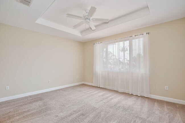 Building Photo - Stylish and Spacious 3/2.5 Townhome with Premium Features and Community Pools