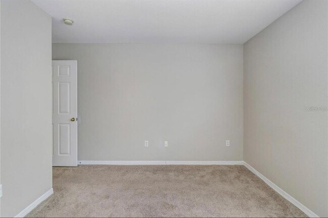 Building Photo - 9506 Lake Chase Island Way