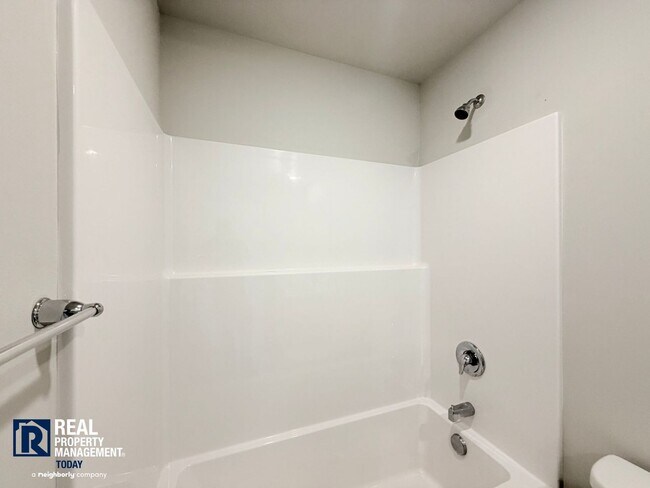 Building Photo - Brand-New 3BR Town Home Near JBLM | Bonus Loft, 2-Car Garage & Modern Finishes