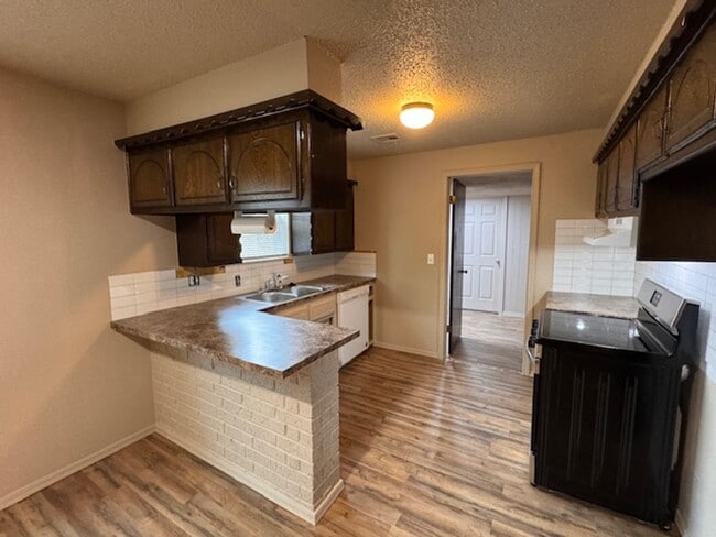 Building Photo - All brand new inside! A true 4 bedroom in Moore Schools, no carpet, All luxury vinyl plank!