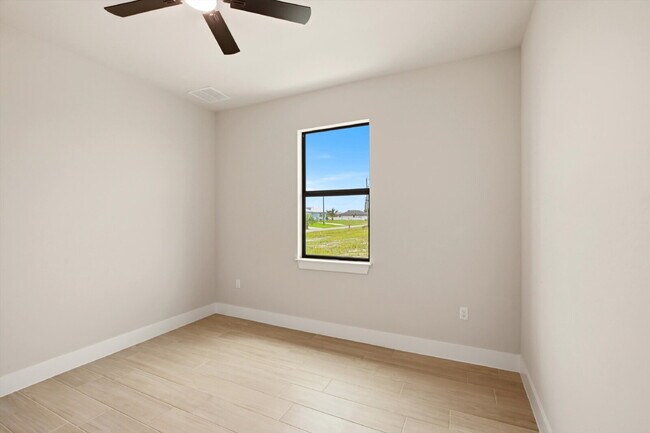 Building Photo - New Construction 3/2 Pool Home on Canal, $2,699, NW Cape Coral. The Only Thing Used Here Is the W...