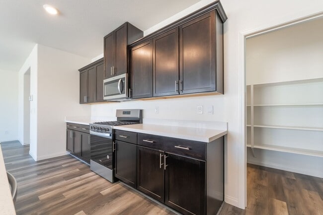 Building Photo - Brand-new 4-bedroom home located in the de...