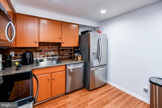 Building Photo - 8317 Canning Terrace