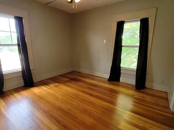 Building Photo - "Spacious 5-Bedroom Retreat with Fireplace Charm on S Broadway!"