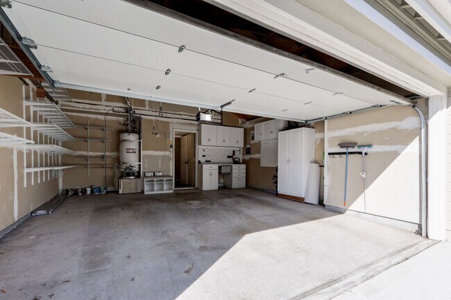 Building Photo - 3BR/3BA Pet-Friendly Village In The Park Townhome with Pool & 2-Car Garage | YouTube Tour