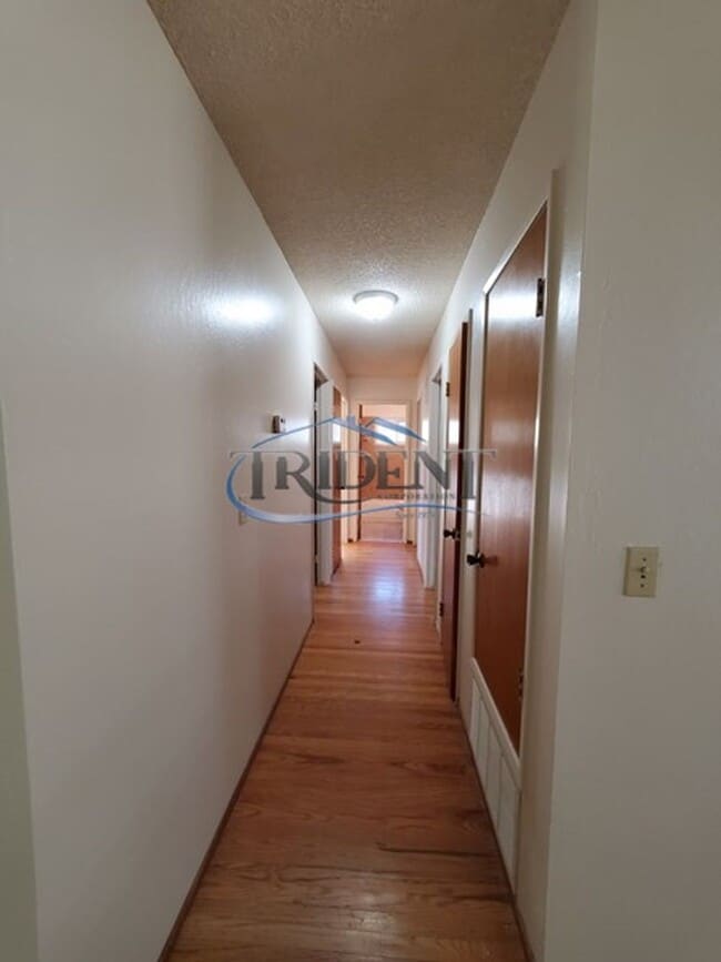 Building Photo - This is a cute 4 bedroom, 2 bath house in an established Woodland community