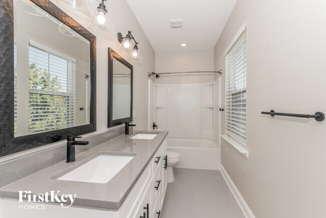 Building Photo - 3763 Plantation Oaks Blvd