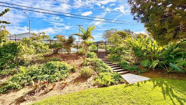 Building Photo - Beautiful Craftsman-style Home with fenced yard space, detached garage and additional parking in ...