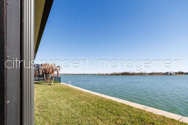 Building Photo - Stunning Double Waterfront 4/3 Home with Dock and Electric Boat Lift