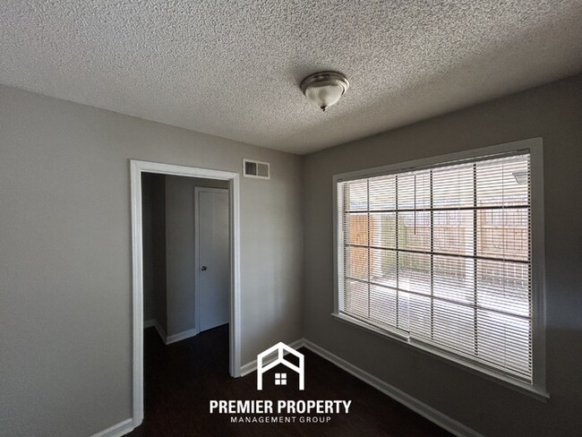 Building Photo - Stunning 3BR/2BA Near Southwind | 2,079 Sq Ft, Built-Ins, Fireplace & Covered Patio