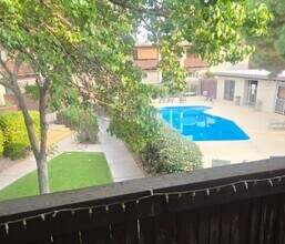Building Photo - CHECK OUT THE POOLSIDE VIEW!!  **ALL UTILITIES ARE INCLUDED & REDUCED PRICE FOR JULY!