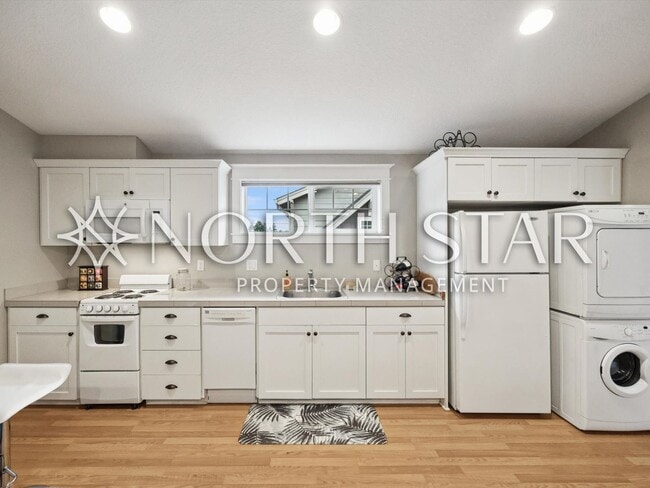 Building Photo - Exceptional Custom Home with Fully Appointed ADU in Prime John’s Landing Location