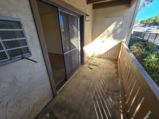 Building Photo - Move-In Special: 1/2 off 1st Month's Rent!!!  Freshly Painted 1-Bedroom Condo with Covered Parking