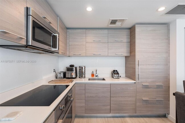 Building Photo - 1300 S Miami Ave