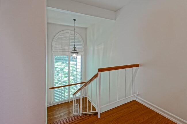 Building Photo - BRIGHT & AIRY, REAR-UNIT TOWNHOUSE W/ SPACIOUS PATIO, BALCONY & HUGE 2-CAR GARAGE IN GATED COMMUN...