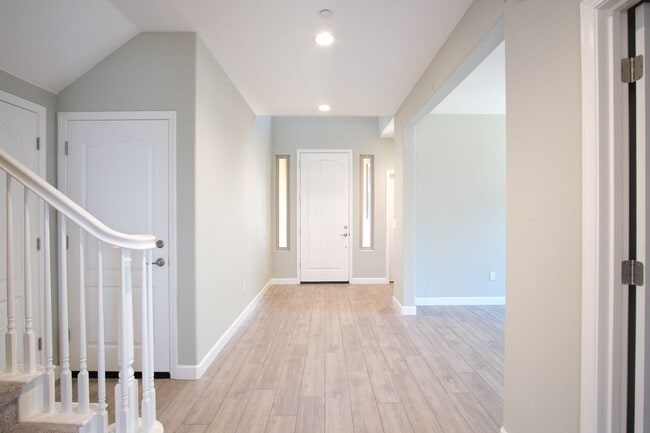 Building Photo - Available now! Beautiful Newer Home in Man...