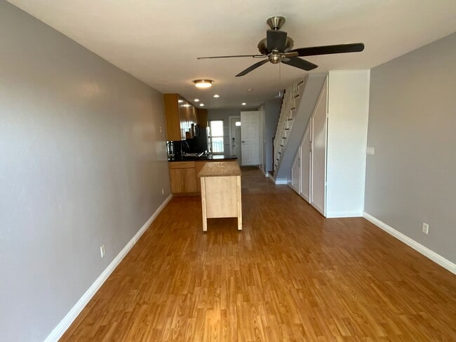 Building Photo - Long-Term Unfurnished Rental – Available N...