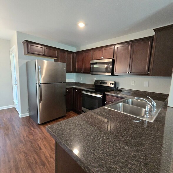 Building Photo - Two-Story Beauty in Olive Branch with Comp...