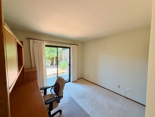 Building Photo - Private Oasis with Sunroom, Balcony & Lush Landscaping | 4BR Home Near Community Pool & Spa