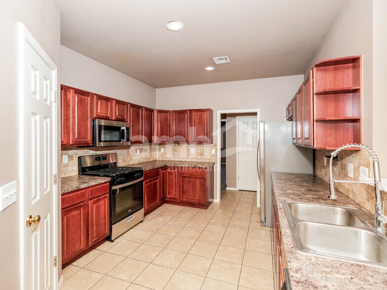 Building Photo - 15006 E 87th Pl N