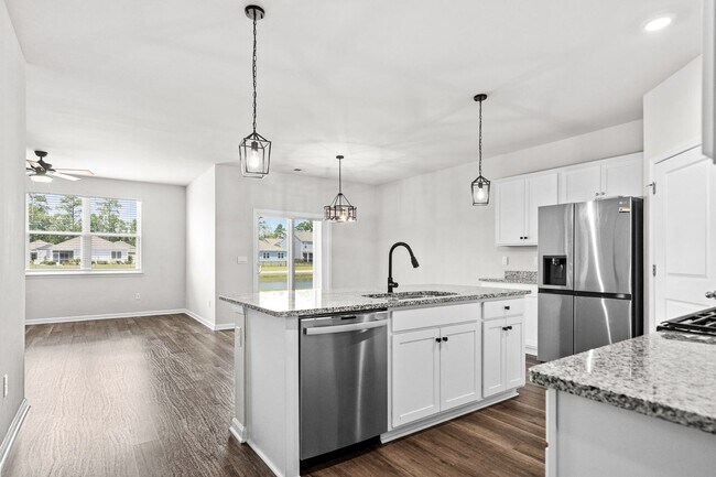 Building Photo - Modern 4BR Home with Screened Porch & Pond Views | Sun Colony, Longs SC