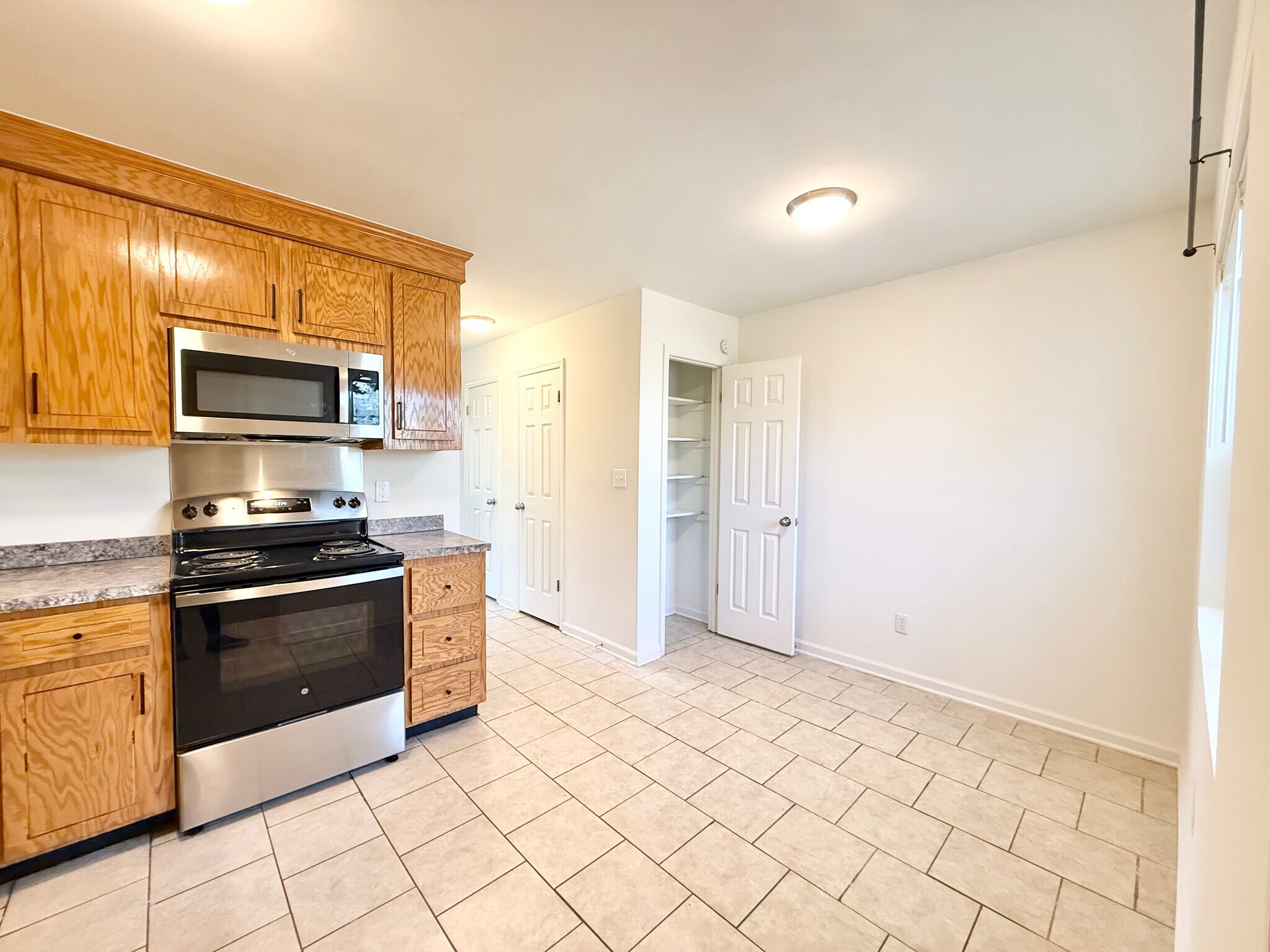 Kitchen / View to Pantry Closet & Dining Area - 274 Fleming Rd