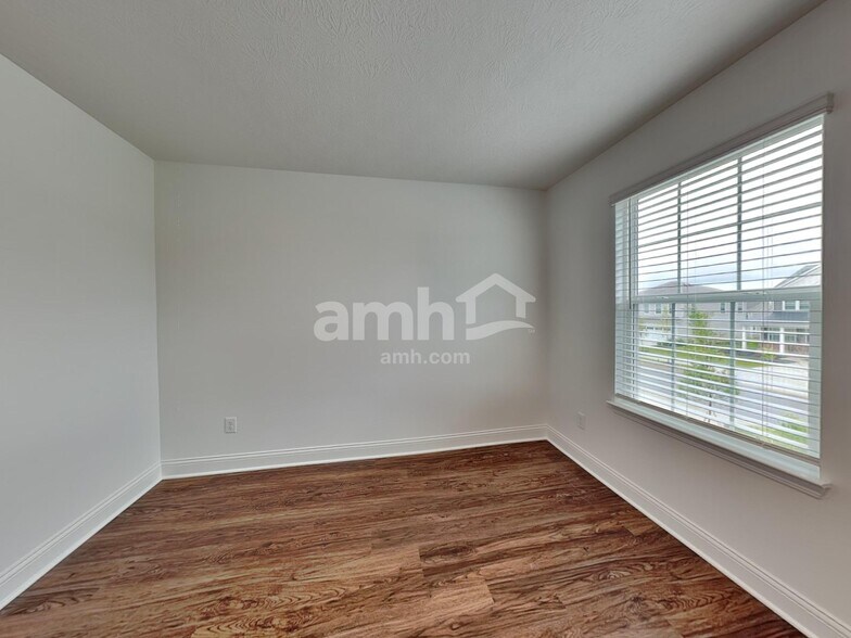 Building Photo - 8393 Merlin Dr