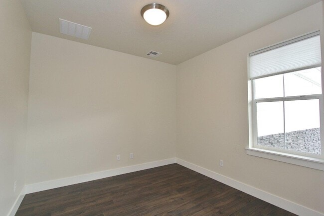 Building Photo - 5857 N Backfire Wy