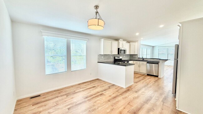 Building Photo - Brand New Manufactured Home in the Tranquil and Private 55+ Rancho Monserate Country Club Community!