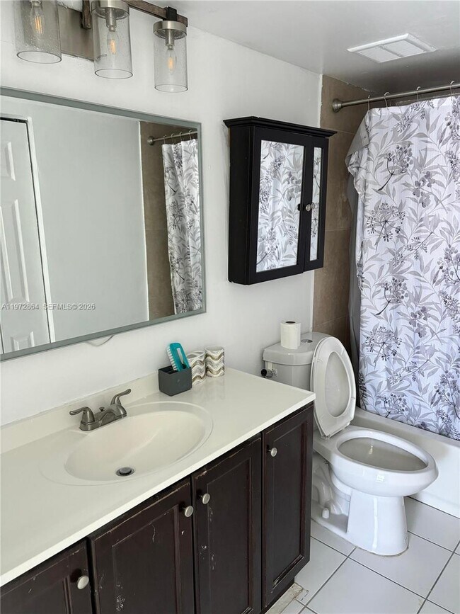 Building Photo - 6715 W 26th Dr