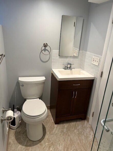 toilet and sink - 7216 15th Ave