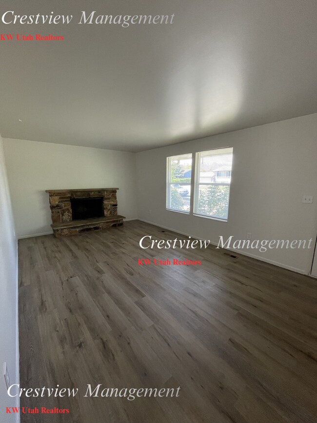 Building Photo - Charming 4-Bedroom Home in West Valley City – Spacious & Convenient Location- 1st month's rent Free!