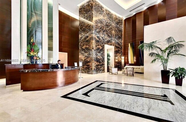 Building Photo - 15811 Collins Ave